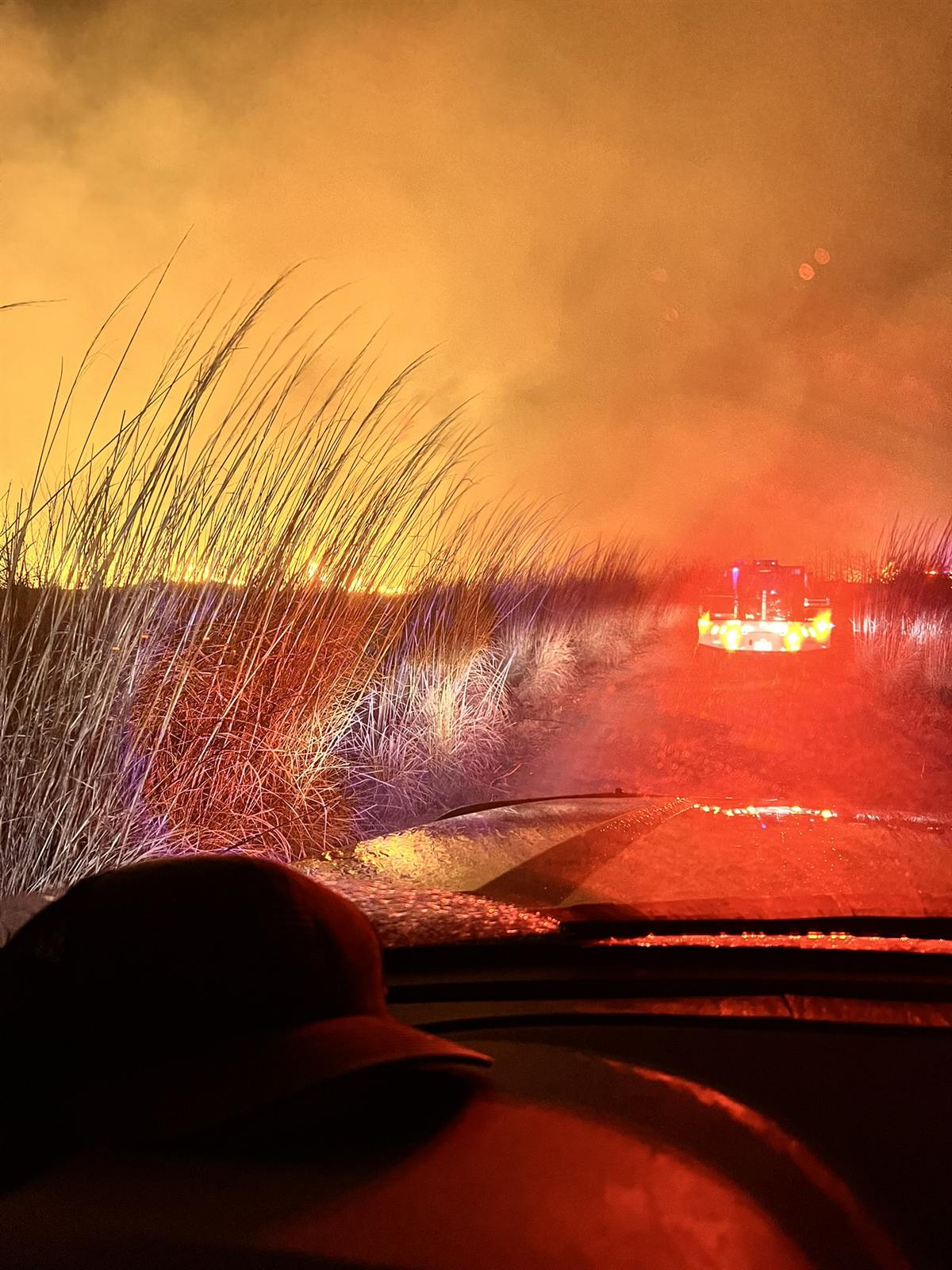 Brush truck working a fire at night